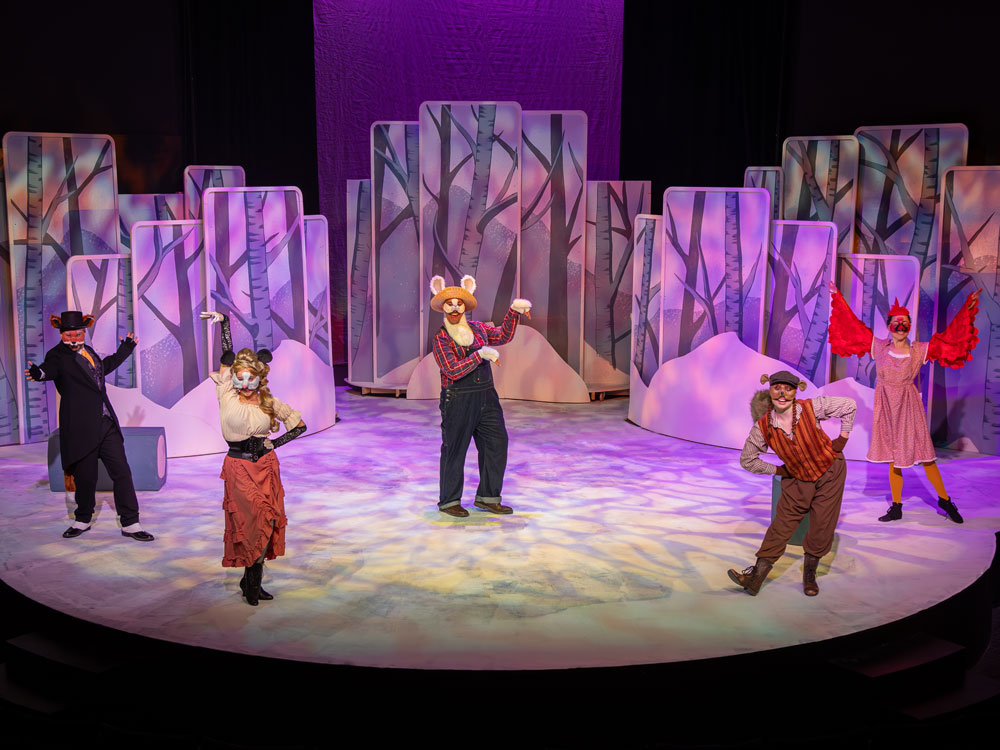 Five actors in animal costumes on the Lilly Theater stage.